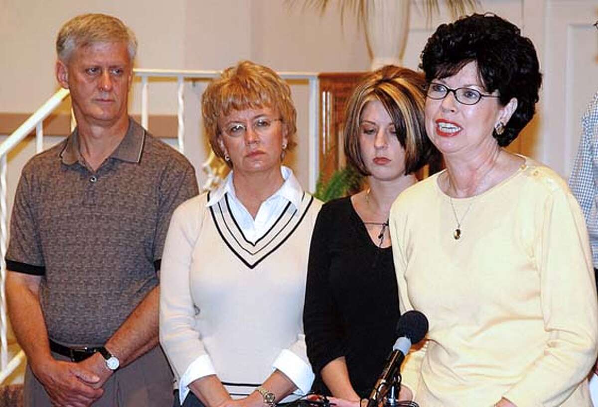 Delores Allen, mother of the late Jason Allen of Zeeland, Michigan, speaks about her son during a press conference at Immanuel Baptist Church in Holland, Michigan on Saturday, August 28, 2004. Jason's father Robert Allen, left, Lindsay Cutshall's mother Kathy Cutshall, and Jason's sister Elizabeth Westra listen in the background.