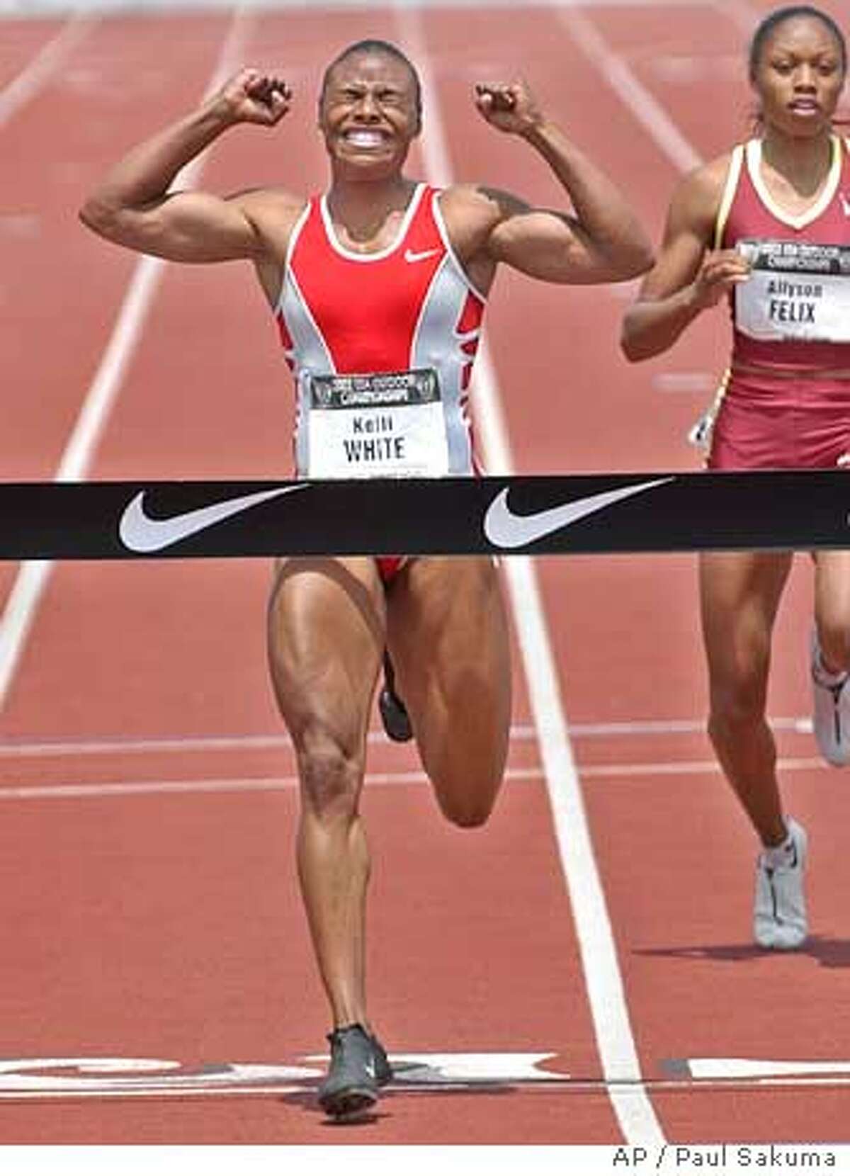 **FILE ** Sprinter Kelli White, left, reacts after winning in the finals of the 200 meters in 22.21 seconds in the U.S. track and field championships, in this June 22, 2003 photo, in Stanford, Calif. White broke down and cried Thursday as she recounted in an interview the first time she used a substance called THG, once an undetectable steroid. In her first newspaper interview since she received a two-year ban from the U.S. Anti-Doping Agency, White said she first learned of the substance four years ago when her coach, Remi Korchemny, introduced her to Bay Area Lab Co-Operative (BALCO) president Victor Conte. (AP Photo/Paul Sakuma, file) Ran on: 12-12-2004 Sprinter Kelli White won two world titles while using steroids. A JUNE 22 2003 FILE PHOTO Ran on: 02-21-2005 Sprinters Kelli White (left) and Tim Montgomery say Dr. Brian Goldman helped them obtain performance-enhancing substances. White says Goldman provided her with modafinil, while Montgomery says Goldman wrote a prescription for a drug that boosts testosterone. Ran on: 02-21-2005 Sprinters Kelli White (left) and Tim Montgomery say Dr. Brian Goldman helped them obtain performance-enhancing substances. White says Goldman provided her with modafinil, while Montgomery says Goldman wrote a prescription for a drug that boosts testosterone. Ran on: 02-21-2005 Sprinters Kelli White (left) and Tim Montgomery say Dr. Brian Goldman helped them obtain performance-enhancing substances. White says Goldman provided her with modafinil, while Montgomery says Goldman wrote a prescription for a drug that boosts testosterone.