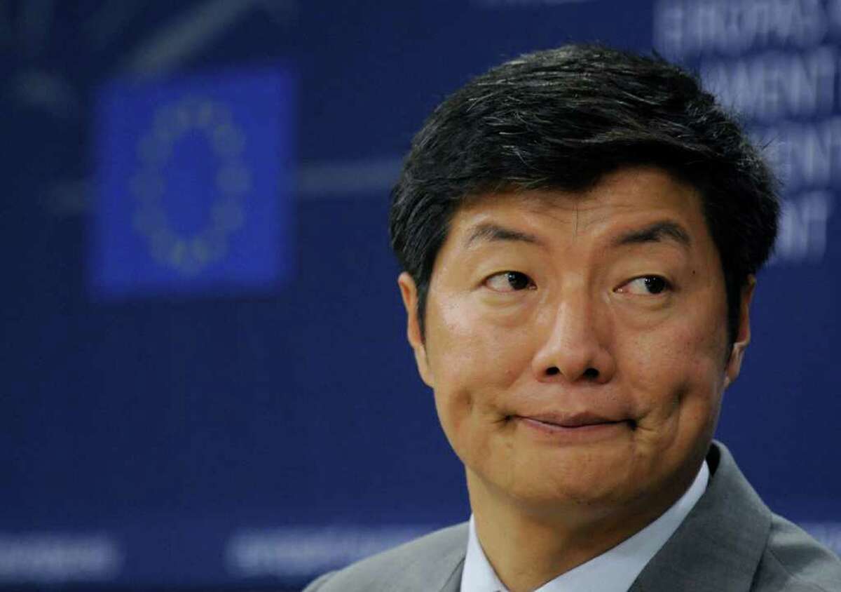 (FILES) This file photo taken on November 29, 2011 shows Tibet's prime minister-in-exile, Lobsang Sangay, giving a press conference at the EU headquarters in Brussels. The Tibetan prime minister in exile has called on the international community to intervene after violent clashes between locals and security forces in a Tibetan-inhabited area of China. "How long and how many tragic deaths are necessary before the world takes a firm moral stand?" recently elected exiled premier Lobsang Sangay said in a statement on January 25, 2011. AFP PHOTO / JOHN THYS / FILES (Photo credit should read JOHN THYS/AFP/Getty Images)