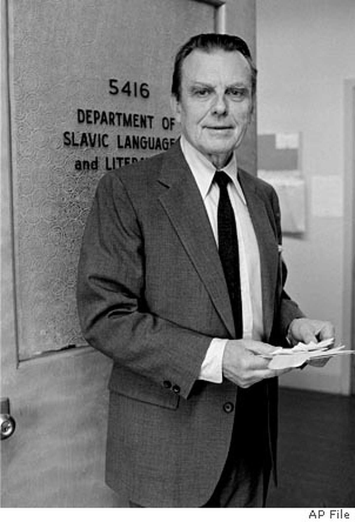 *** FILE *** Nobel Prize winner for literature Czeslaw Milosz poses at his office at the University of California in this Thursday, Oct. 10, 1980 file photo. The Polish poet and Nobel laureate Czeslaw Milosz, known for his intellectual and emotional works about some of the worst cruelties of the 20th century, died Saturday, the Polish news agency PAP reported. He was 93. (AP Photo)