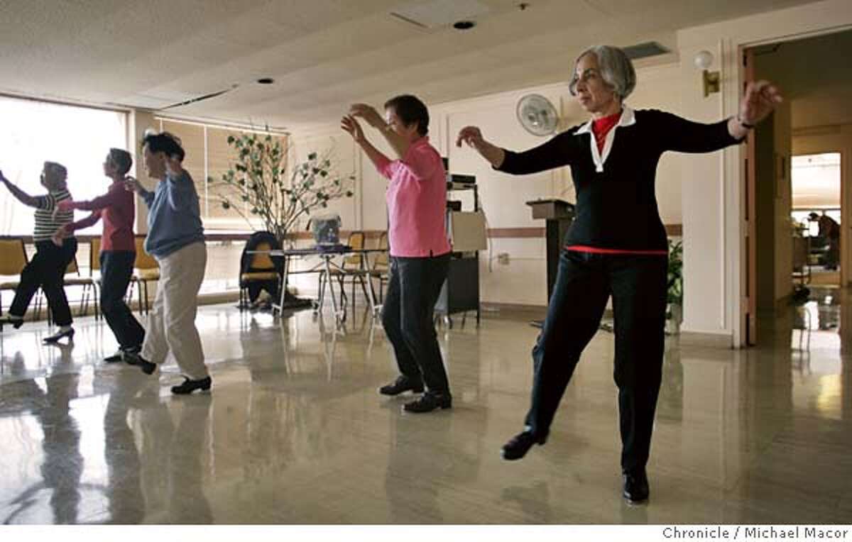 Lupe Bravo, 72 participates in a tap dance class at On Lok Senior Center. She lost her husband 2 years ago, and is now on her own. Fellow dancers l to r- Patricia Kwong, Jint Li, Betty Yuen and Shirley Kwan. The Social Security Administration is tageting women, in their reforms to fix the system. We talk with a range of women over the issue. Photo taken in San Francisco on 1/27/05, CA. by MICHAEL MACOR / San Francisco Chronicle