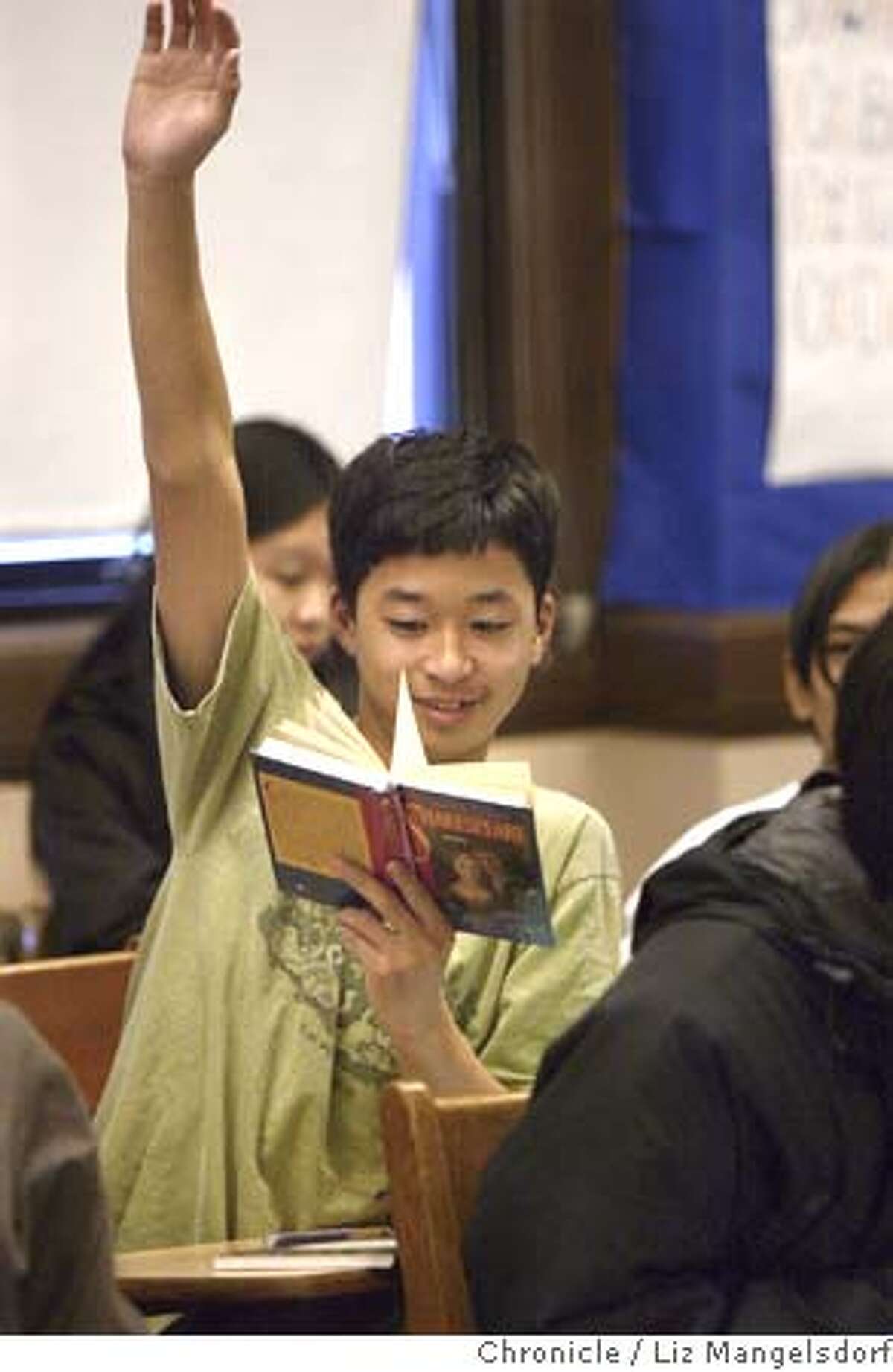 balboa27_304_lm.JPG Event on 1/26/05 in San Francisco. Balboa 9th grader Kamal Nguyen raises his hand to discuss Shakespear's Romeo and Juliet during 9th grade World Lit Honors class. Story on Balboa High School, and their work to get more students into Advanced Placement courses. They start in 9th and 10th grade with honor courses to prepare students for AP. Liz Mangelsdorf / The Chronicle MANDATORY CREDIT FOR PHOTOG AND SF CHRONICLE/ -MAGS OUT
