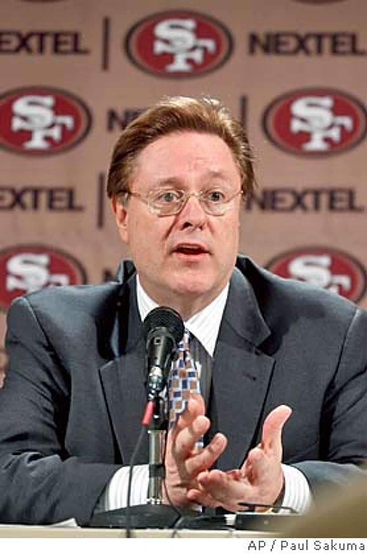 San Francisco 49ers owner John York announces that the 49ers fired coach Dennis Erickson and dismissed general manager Terry Donahue during a news conference at 49ers headquarters in Santa Clara, Calif., Jan. 5, 2005. The announcement came three days after the team finished the season with the NFL's worst record of 2-14. (AP Photo/Paul Sakuma)