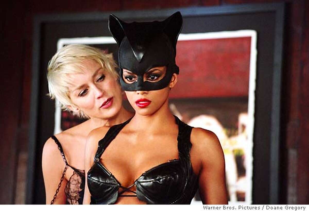 SHARON STONE (left) and HALLE BERRY in Warner Bros. Pictures' action adventure "Catwoman." PHOTOGRAPHS TO BE USED SOLELY FOR ADVERTISING, PROMOTION, PUBLICITY OR REVIEWS OF THIS SPECIFIC MOTION PICTURE AND TO REMAIN THE PROPERTY OF THE STUDIO. NOT FOR SALE OR REDISTRIBUTION.