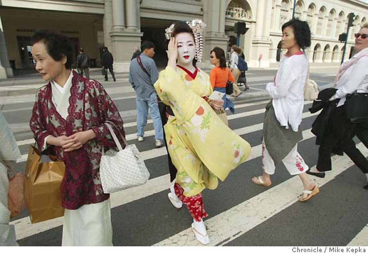 Japanese apprentice geisha, Umechika, 20, visits the Ferry building during a day of tourism after she and another Geisha named Uneha, 25, were helping with the Geisha exhibit at the Asian Art Museum. 6/23/04 in San Francisco. Mike Kepka / The Chronicle