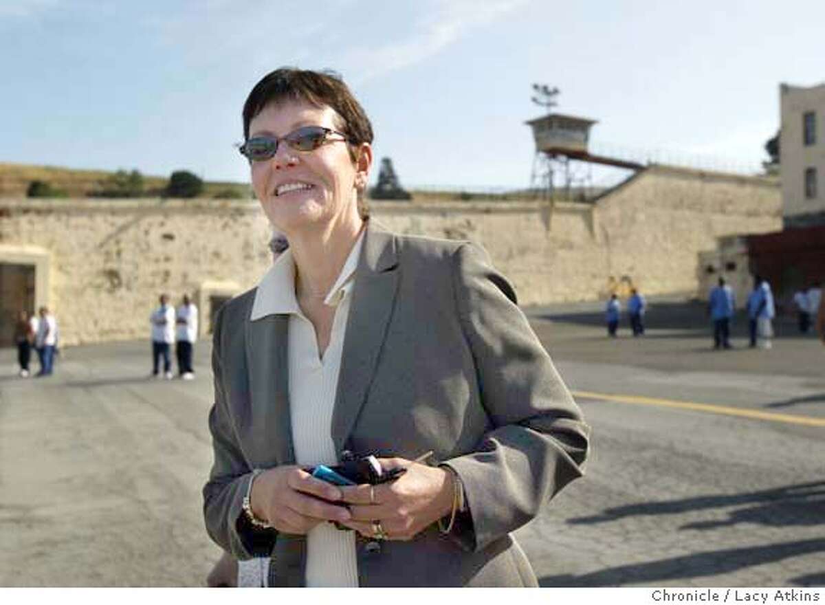California Department of Corrections director Jeanne Woodford walks through the Yard at San Quentin Prison, Saturday May 1, 2004. She was the warden for 25 years and this is her first visits since leaving Feb 23, 2004, when she moved up the Sacramento to help clean-up the CDC budget problems. LACY ATKINS / The Chronicle