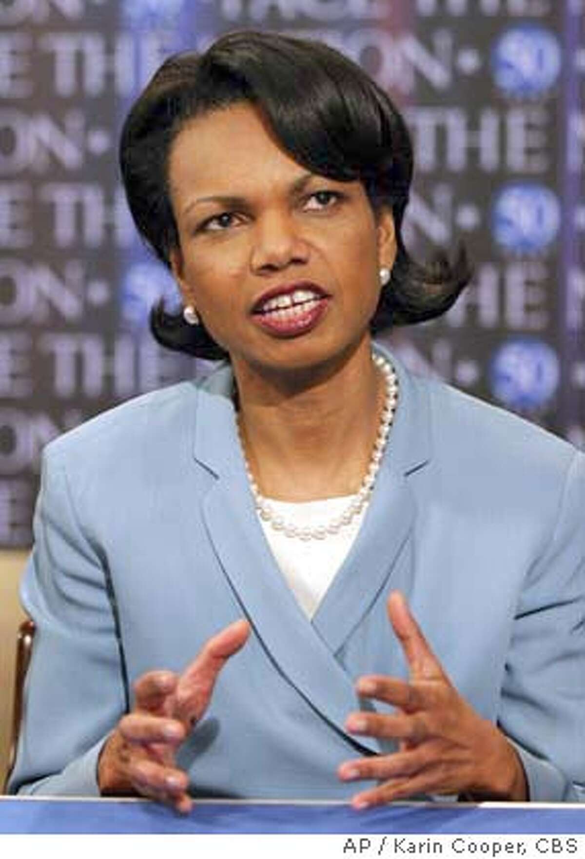 Author takes whacks at distaff side of the Bush administration Flanders