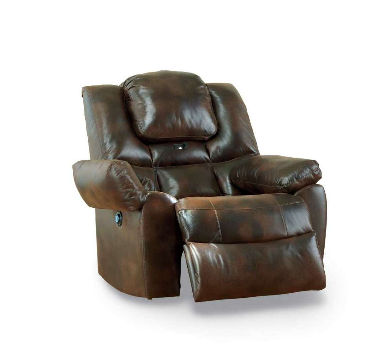 This leather power lift recliner by JCP home offers dual massage and heat with dashboard-mount control a retractable LED reading light and hidden storage compartments in both arms, as well as a cup holder and magazine pocket, $1,150 at JCPenney.