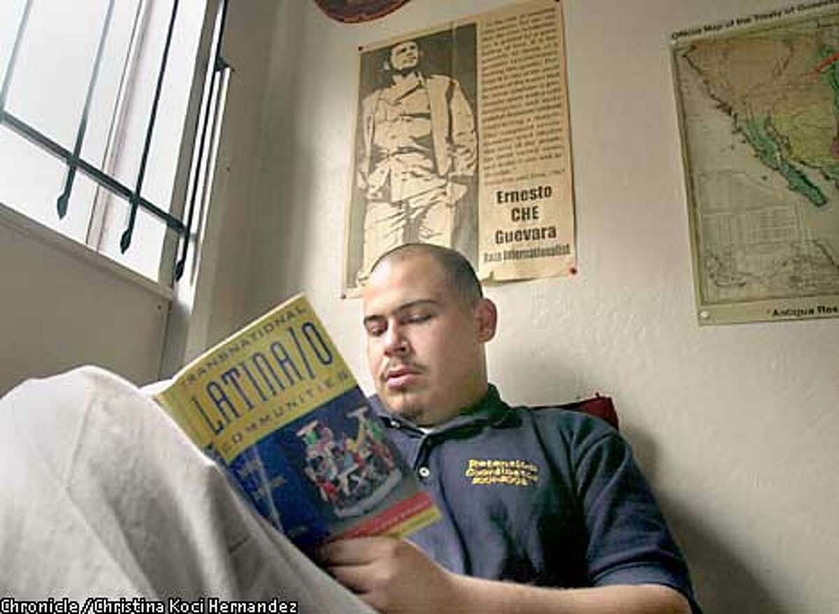 CHRISTINA KOCI HERNANDEZ/CHRONICLE Hernandez in his UB Berkeley apartment room. Roberto Hernandez, activist at UC Berkeley, is being refused his degree for his role in protests on campus.