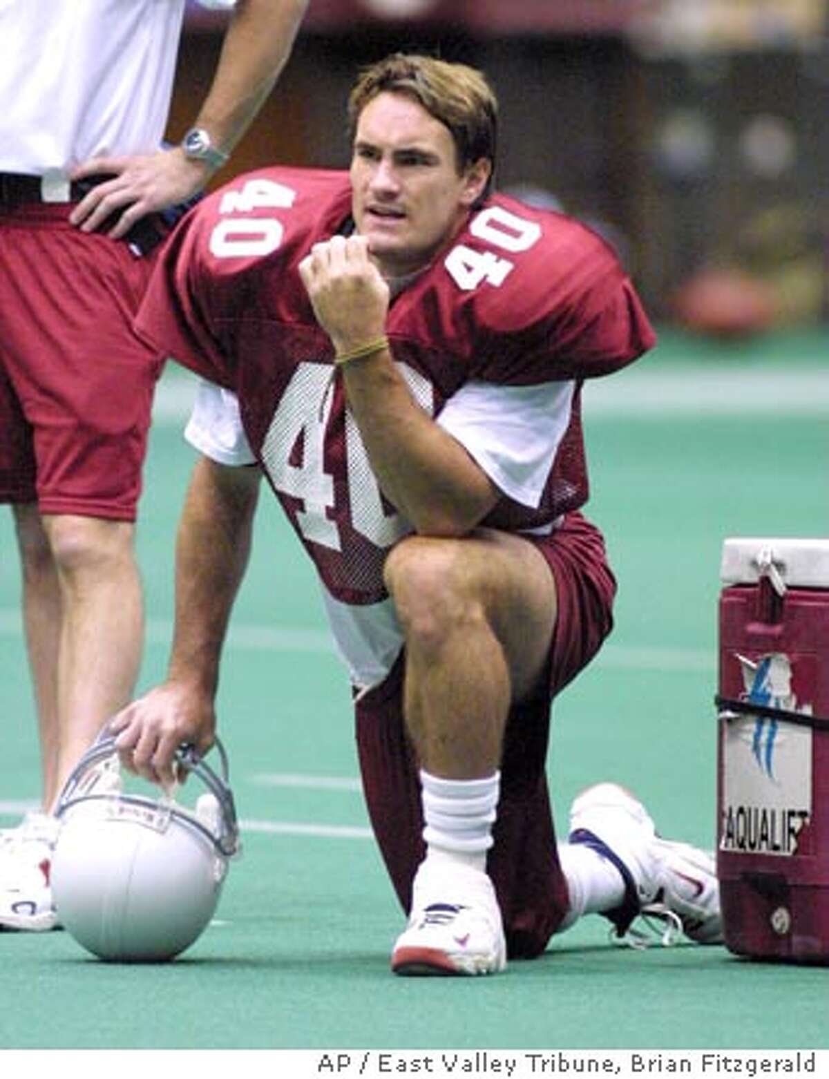 Safety Pat Tillman (40) watches practice during the Arizona Cardinals summer camp in Flagstaff, Ariz., in this July 30, 2001 photo. Tillman was killed by friendly fire as he led his team of Army Rangers up a hill during a firefight in Afghanistan last month, newspapers in California and Arizona reported Saturday May 29, 2004. (AP Photo/East Valley Tribune, Brian Fitzgerald) ARIZONA REPUBLIC OUT