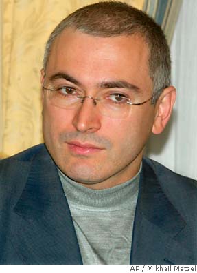 Jailed Russian oil magnate goes on trial / Charges seen as Kremlin ...