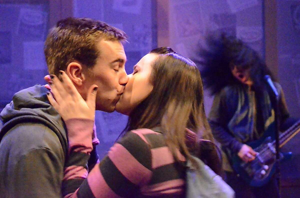Hackers Marcus (Daniel Petzold) and Ange(Marissa Keltie) share a first kiss in Josh Costello's "Little Brother" at Custom Made Theatre