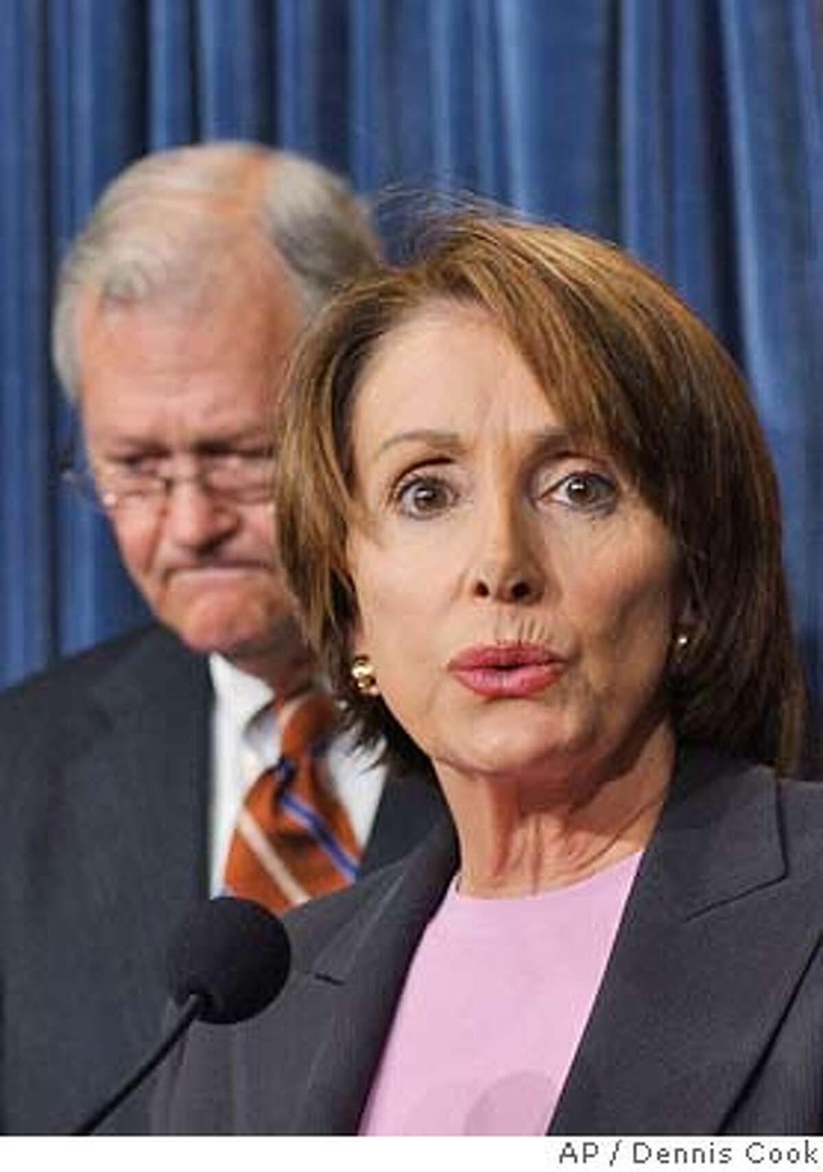 House Minority Leader Nancy Pelosi, D-Calif., calls for Defense Secretary Donald Rumsfeld's resignation on Capitol Hill Thursday, May 6, 2004, following revelations related to the treatment of of Way. At left is Rep. Ike Skelton, D-Mo. (AP Photo/Dennis Cook)