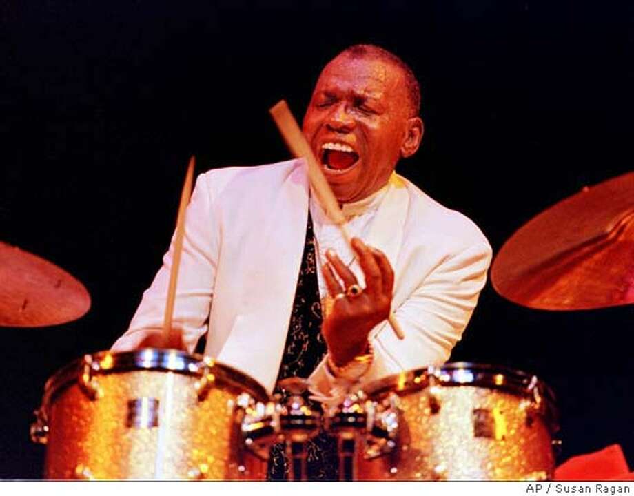 ** FILE ** Elvin Ray Jones is shown in an Oct. 26, 1997, file photo while performing at the San Francisco Jazz Festival. Jones, a renowned jazz drummer and member of John Coltrane's quartet who also played alongside Duke Ellington, Charlie Parker and Miles Davis, died Tuesday, May 18, 2004. He was 76. (AP Photo/Susan Ragan, File) OCT. 26, 1997 FILE PHOTO Photo: SUSAN RAGAN