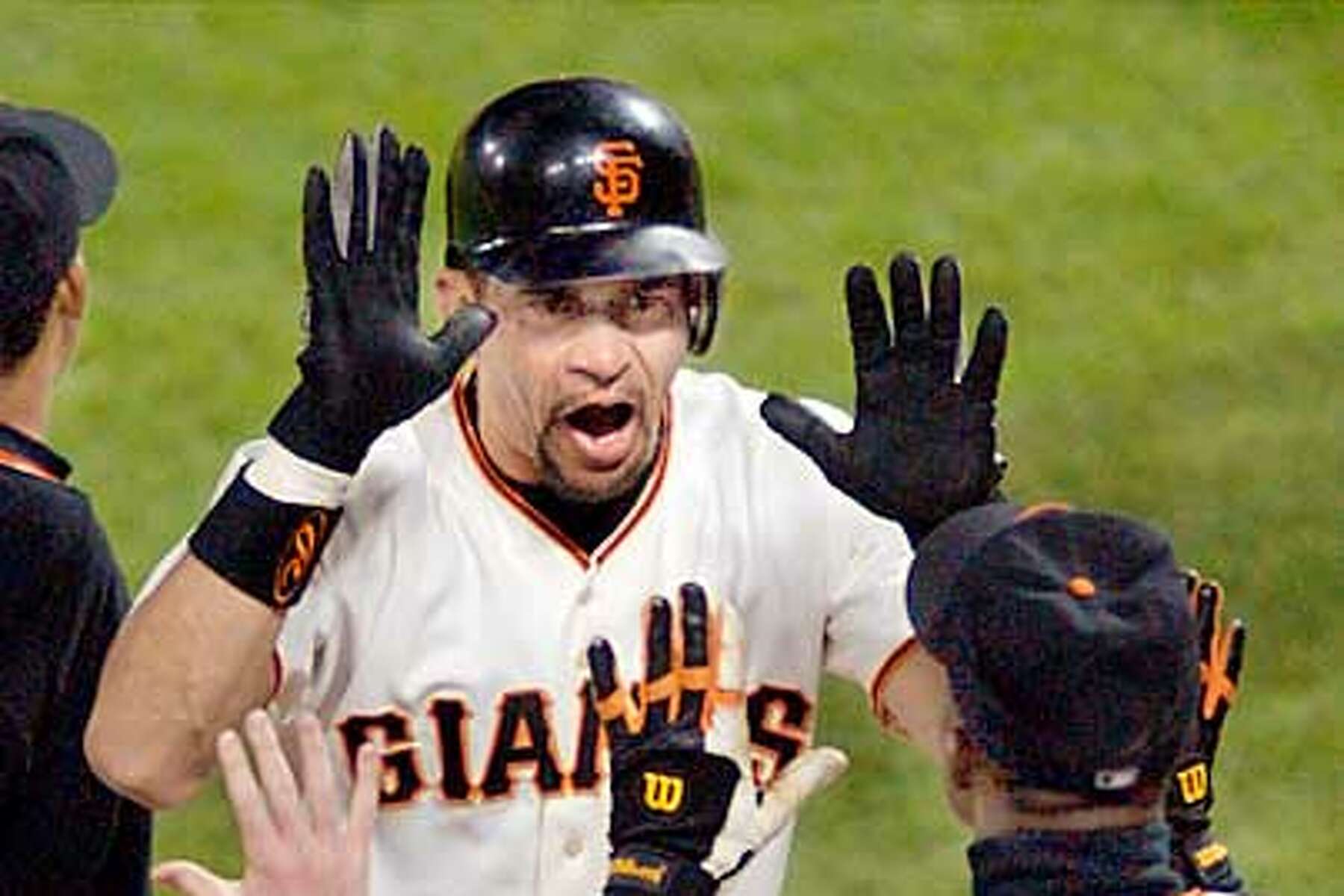 Former San Francisco Giants catcher Benito Santiago throws out the first  pitch during Game 2 of the National League Championship Series on Monday,  October 15, 2012, at AT&T Park in San Francisco