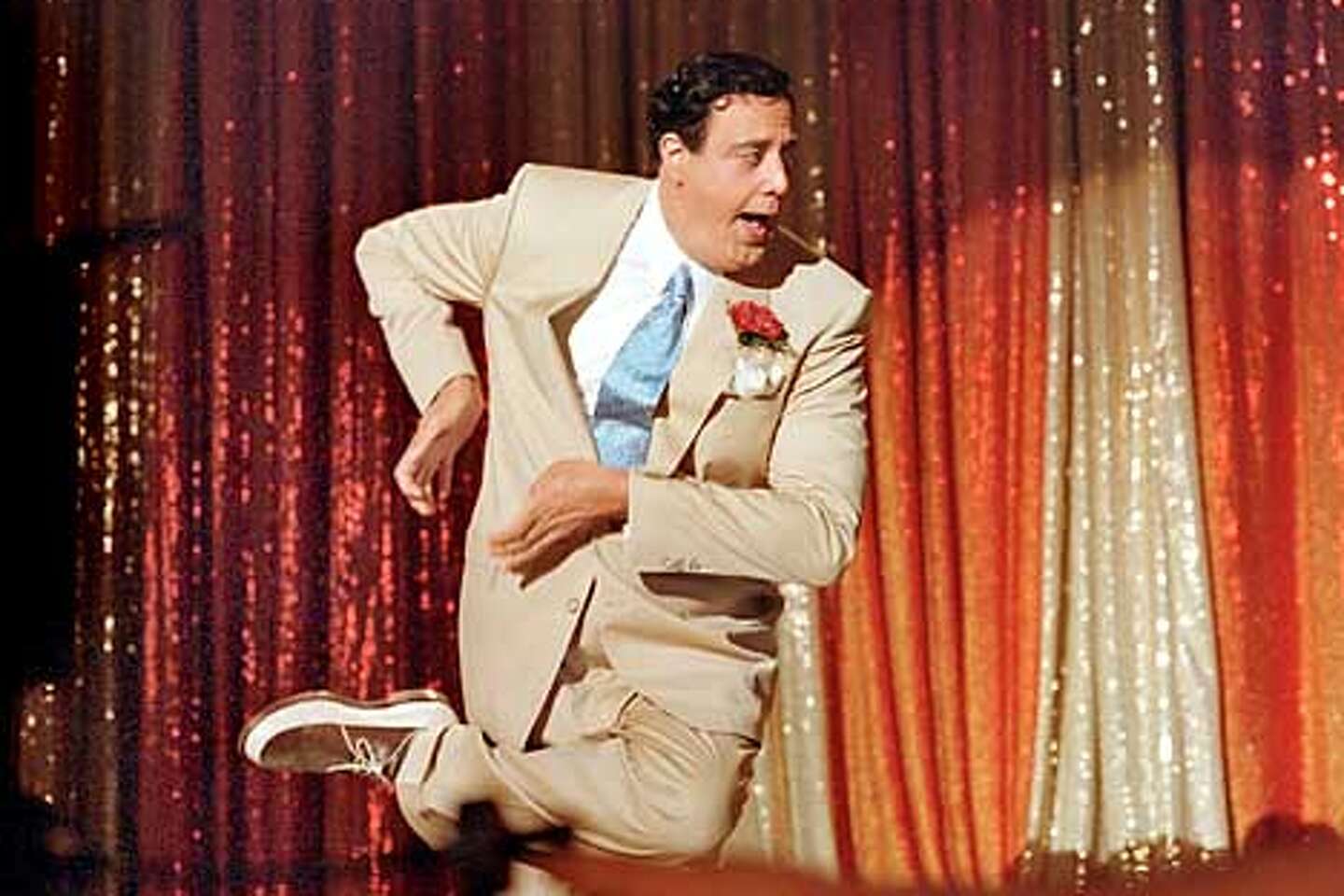 And awaaay he goes / Brad Garrett fulfills dream of playing troubled, talented Jackie Gleason in