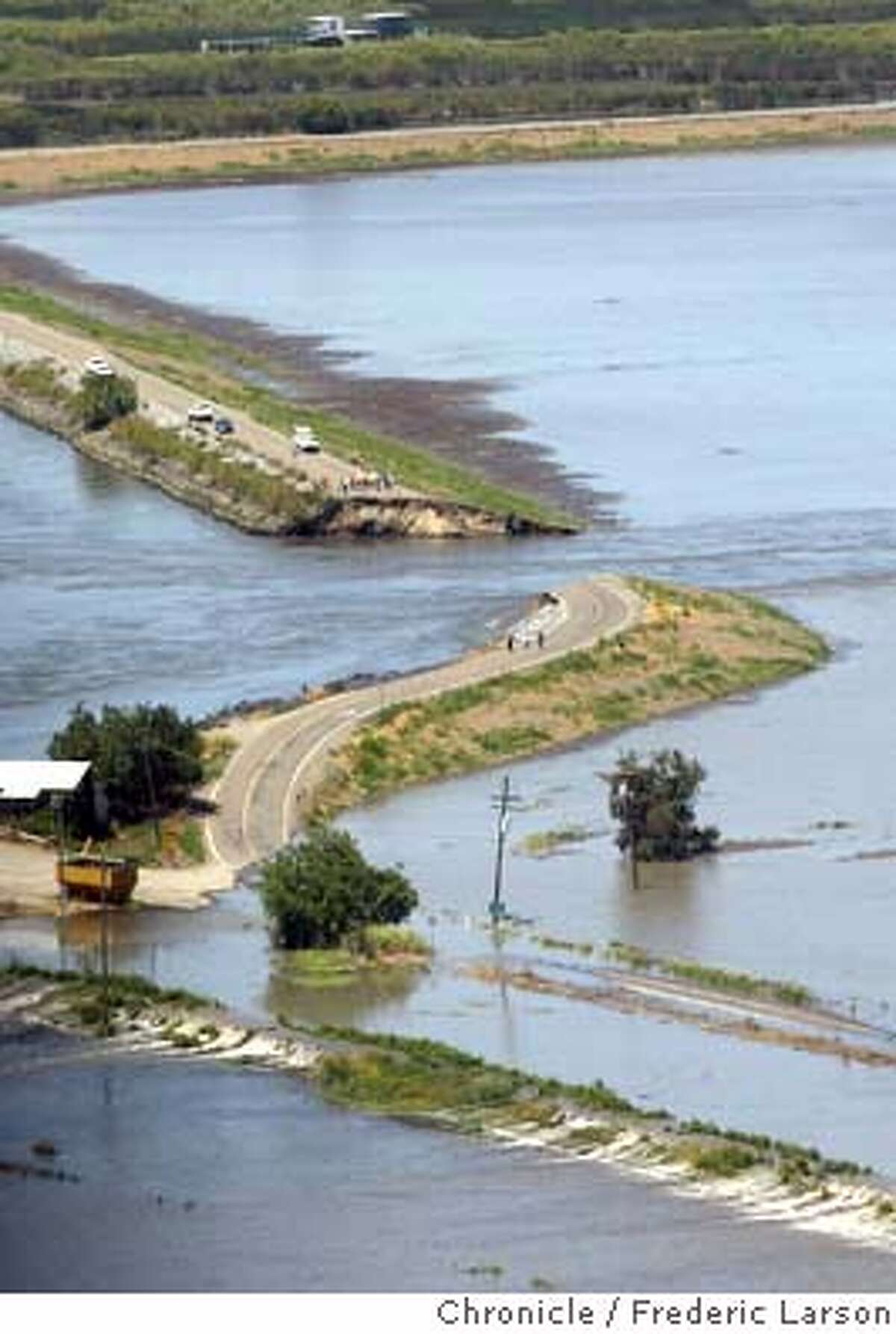 ; A levee break west of Stockton flooded farm fields on Bacon Island Thursday morning near a railroad line and pipelines that carry drinking water to the San Francisco Bay area. Neither the railroad line or water pipelines were immediately affected. Water officials were working to maintain the quality of drinking water flowing to cities as far away as Los Angeles. Coast Guard Petty Officer Wendy MacLean said about 65 feet of the levee gave way about 8:45 a.m. near the intersection of State Route 4 and West Bacon Island Road, north of Woodward Ferry. 6/3/04 San Francisco Chronicle Frederic Larson
