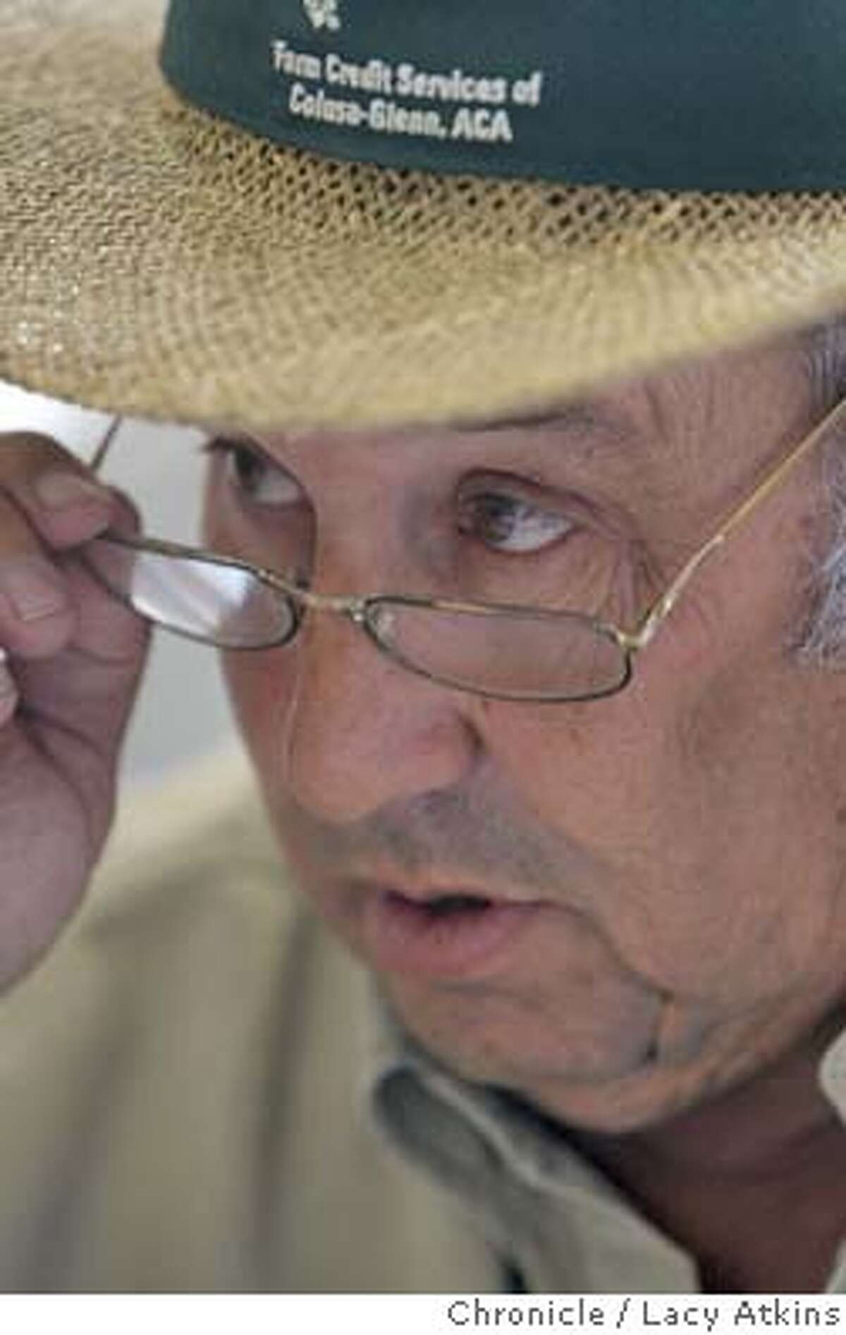 Joe Carrancho, a rice farmers state their views of the California Rice Commission approving a plan to plant genetically engineered rice, at their farms in Glenn County, April 6, 2004. LACY ATKINS / The Chronicle