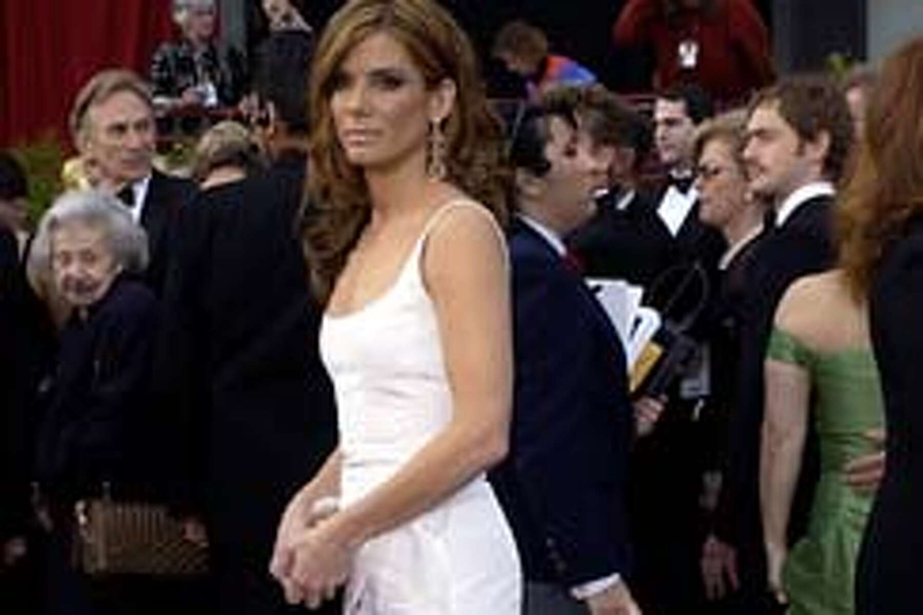 Sandra Bullock dating Jesse James; Britneys wardrobe malfunction; Jude Law snaps at photographers