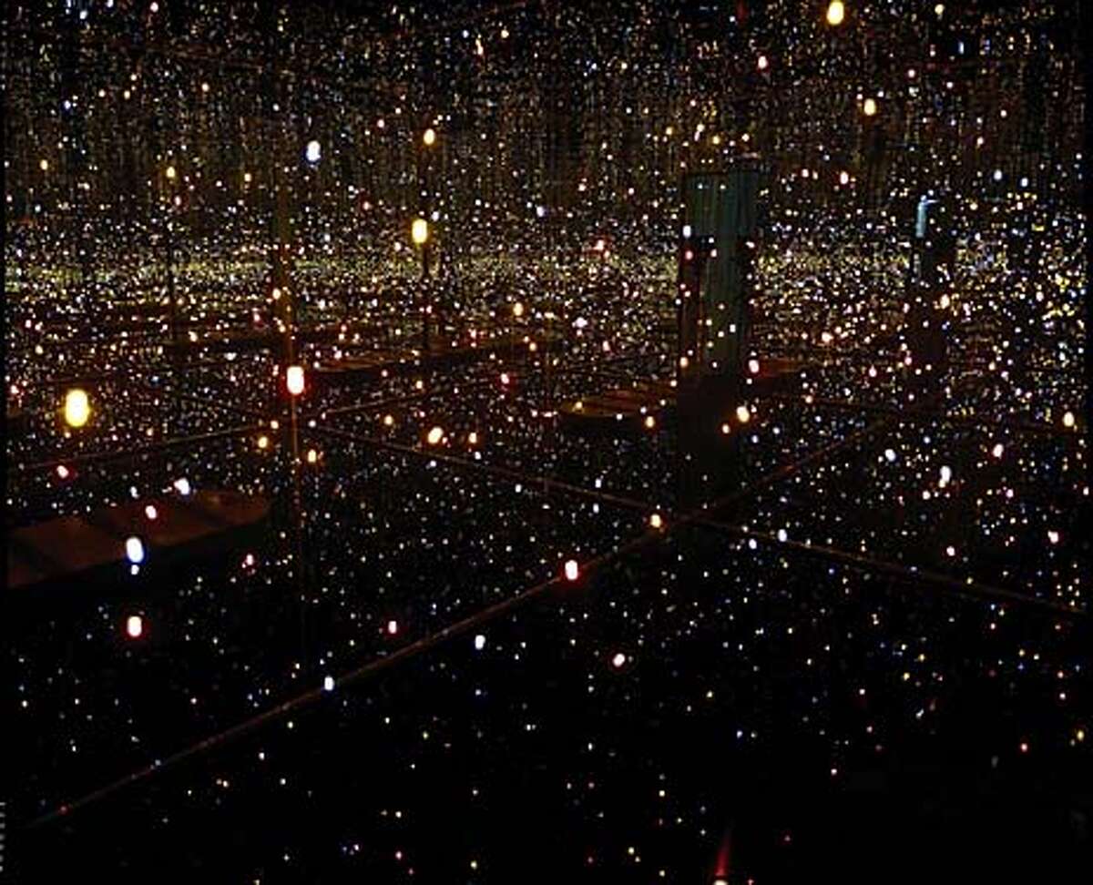 (NYT43) UNDATED -- March 11, 2004 -- WHITNEY-BIENNIAL -- "Fireflies on the Water'' by Yayoi Kusama is part of the 2004 Whitney Biennal. (Adam Reich/Robert Miller Gallery/The New York Times)**ONLY FOR USE WITH STORY BY MICHAEL KIMMELMAN SLUGGED: WHITNEY-BIENNIAL. ALL OTHER USE PROHIBITED. Paul McCarthy, the Los Angeles performance and installation artist and an influential teacher, produced Daddies Big Head (2003).