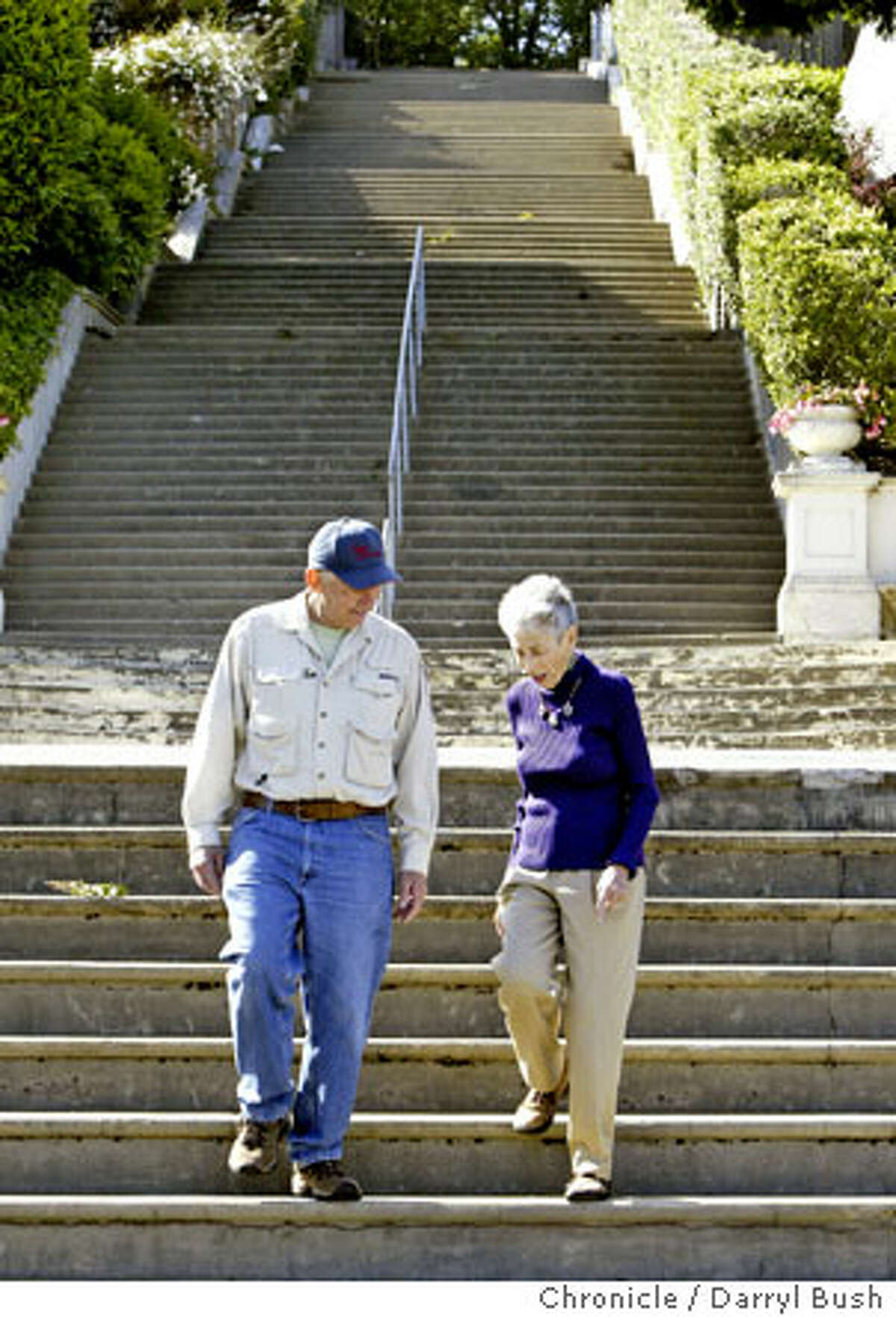 Author Adah Bakalinsky, right, and Charles Brock take in the Pacheco Street steps in Forest Hill. Chronicle photo by Darryl Bush