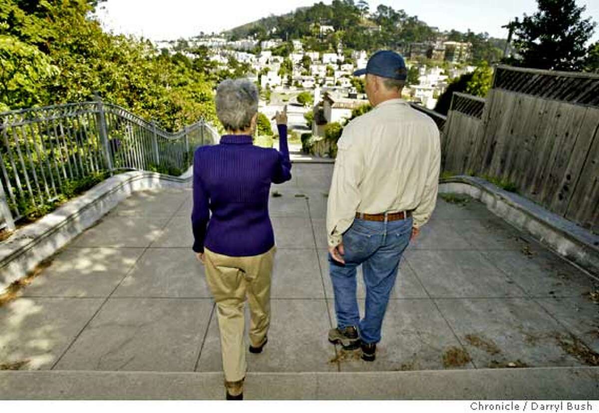 Bakalinsky shares her passion for stairway walks with park ranger Brock, who says he's a "mountain man" with new love for the city. Chronicle photo by Darryl Bush