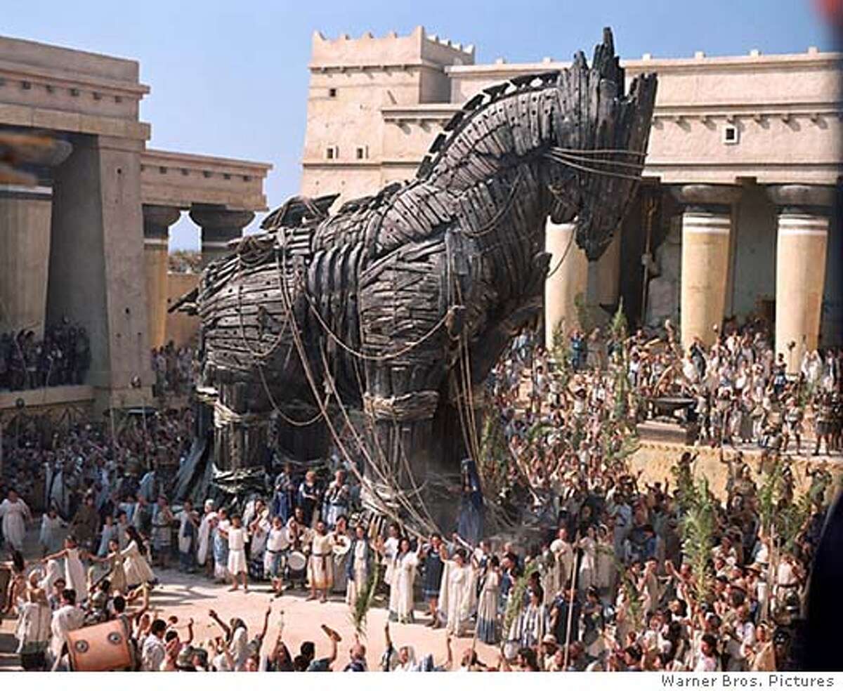 A Trojan horse is shown in a scene from the new action film "Troy" starring Brad Pitt, in this undated publicity photograph. The film opens May 14, 2004 in the United States. REUTERS/Warner Bros/Handout