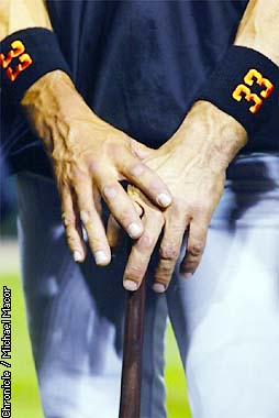 Apr 05, 2002; San Francisco, CA, USA; San Francisco Giants' Benito Santiago,  #33, gets hit by a pitch in the 6th inning of their opening game on Friday,  April 5, 2002 at