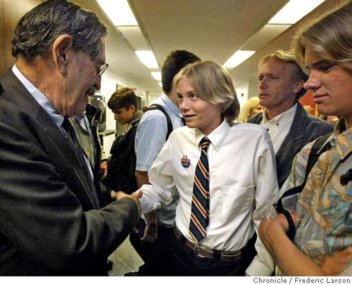 ; Ian Magruder (14) of Santa Cruz meets State Sen. John Vasconcellos who introduced a bill that would allow 14-year-olds to vote. Several teenagers, including, Ian (center), Devin Murphy (13) (right) and Ian father Clark Magruder and a member of the youth commission from San Francisco testify at the State Capital building in Sacramento. 5/5/04 San Francisco Chronicle Frederic Larson