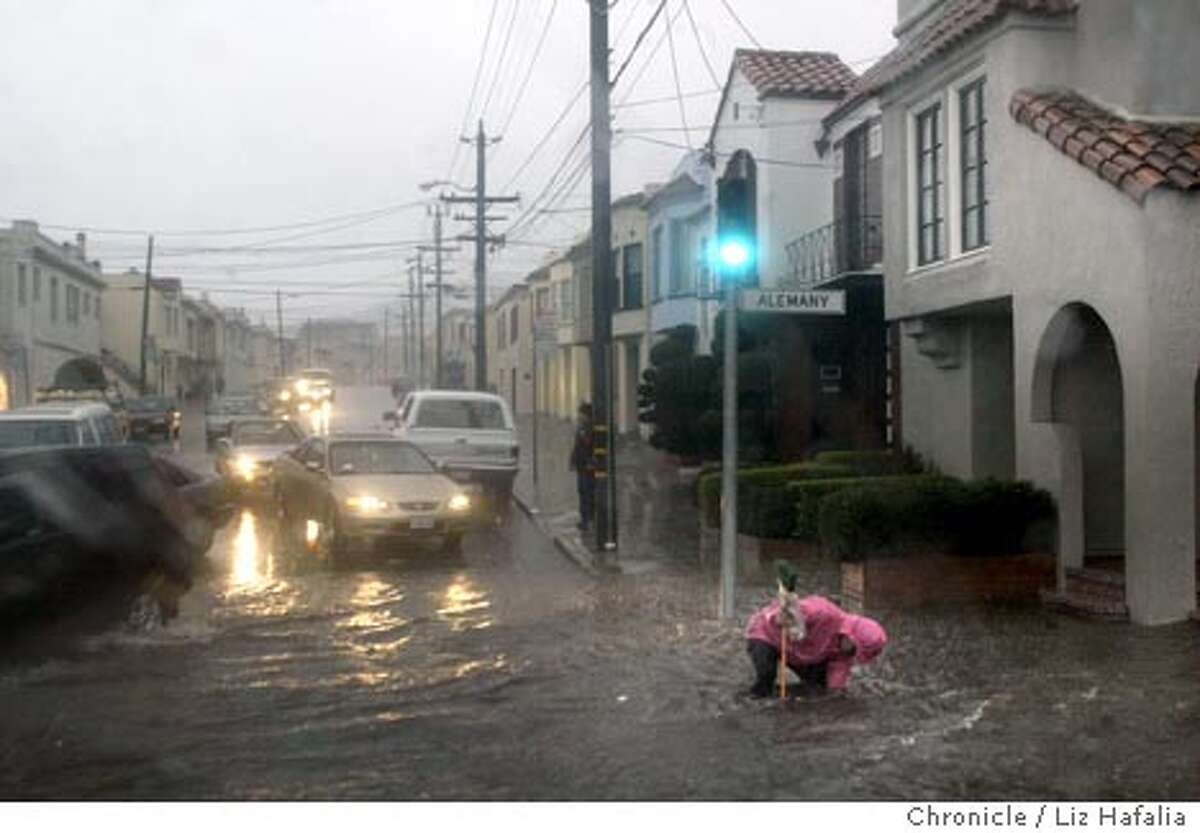 Storm drains didn't handle early downpour fast enough as a flood occured on Alemany Blvd. and Mt. Vernon streets. Shot on 2/25/04 in San Francisco. LIZ HAFALIA / The Chronicle