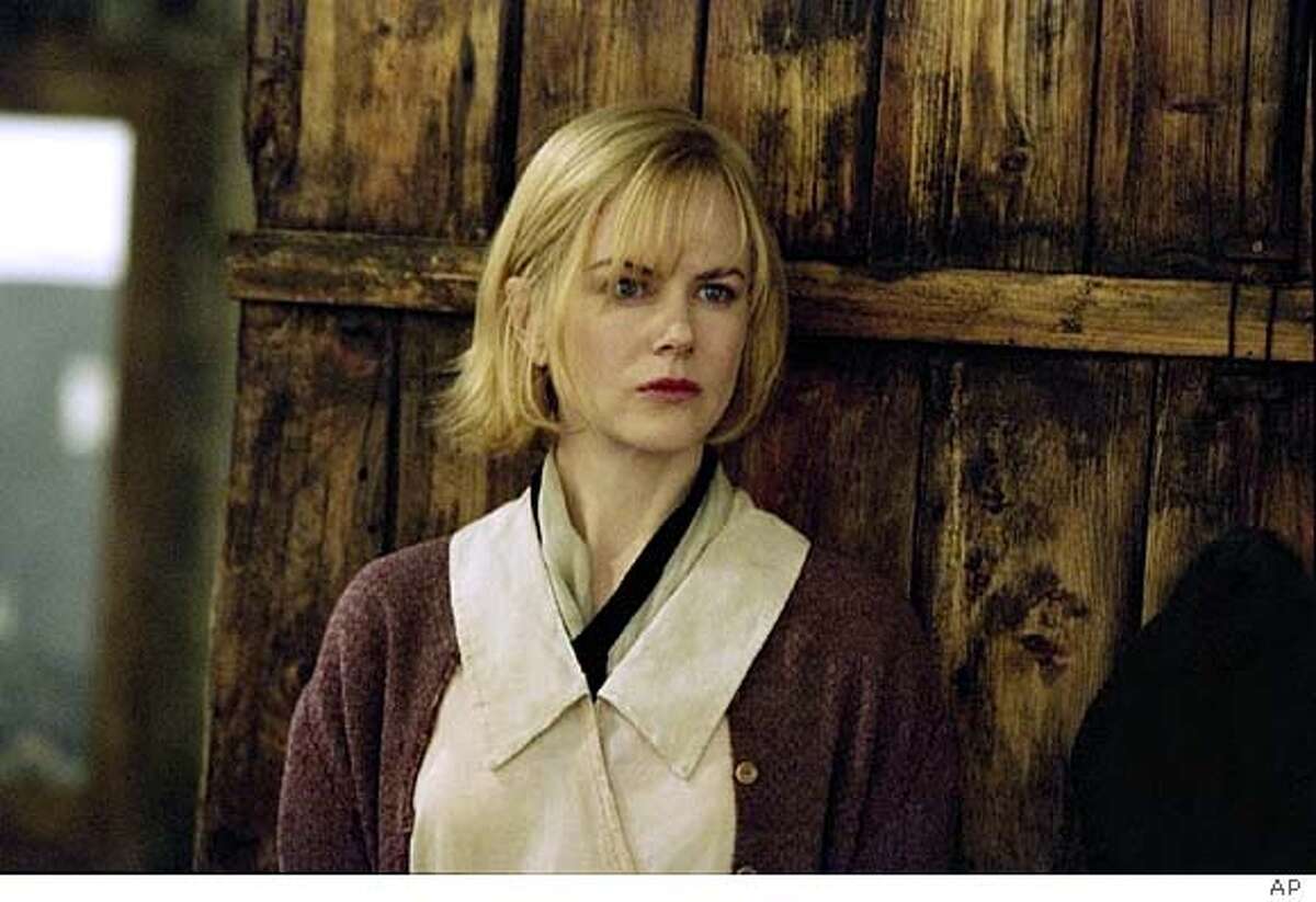 Grace (Nicole Kidman) is on the run, who ends up in a small mountain town in Lions Gates' film "Dogville" (AP Photo/Lions Gate Films) Nicole Kidman plays Grace in Lars von Triers Dogville.