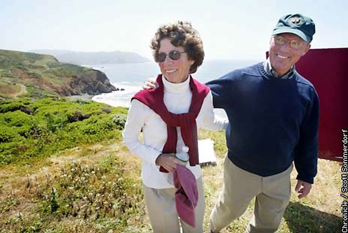 John Reynolds walks with his wife Bobbie (CQ) near the Mori Point site that was added to the GGNRA on Sunday, May 5th, 2002. Reynolds is retiring after being the XXXXX of the National Parks Dept. (SF CHRONICLE PHOTO BY SCOTT SOMMERDORF)