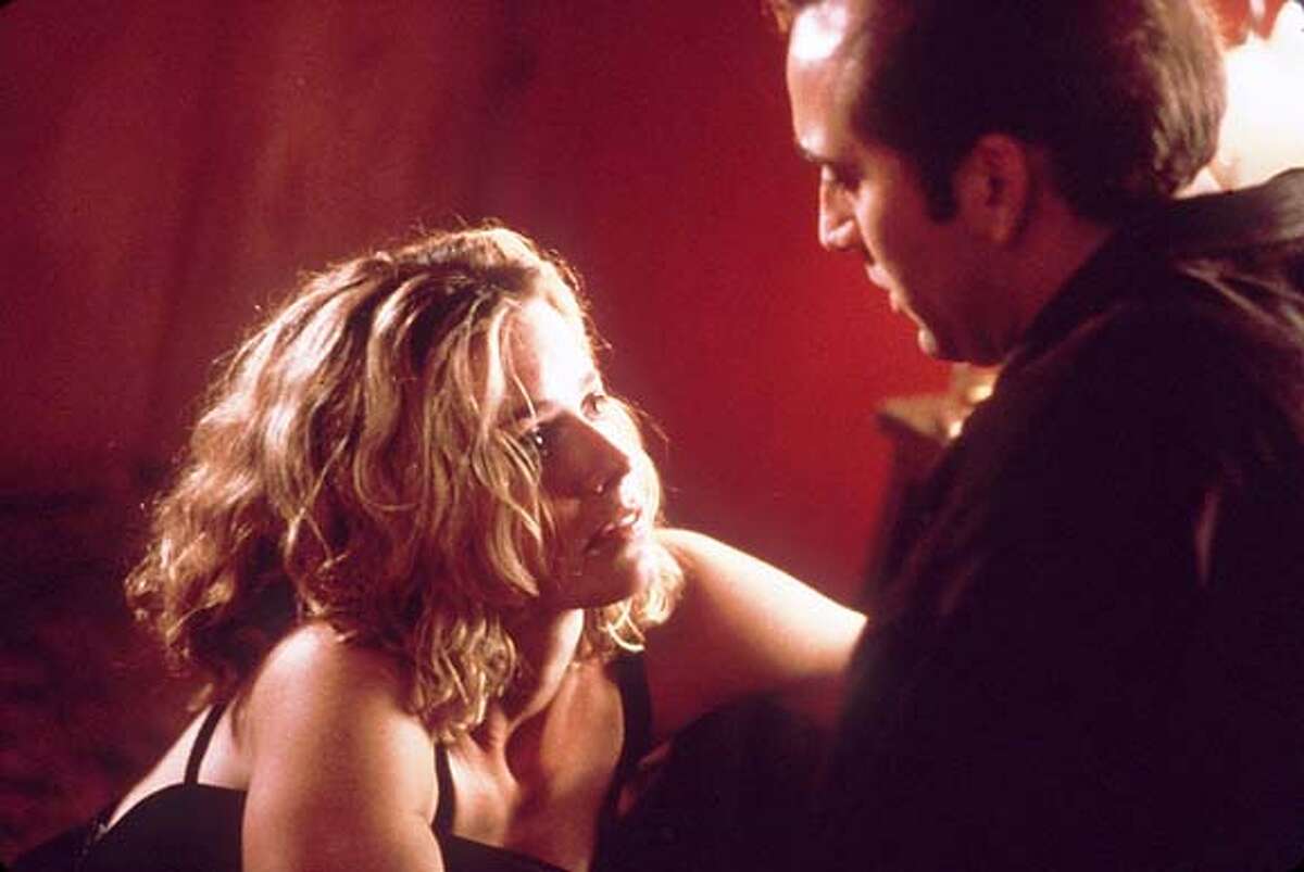 ELISABETH SHUE AND NICOLAS CAGE ARE A HOOKER AND A HARD-CORE DRUNK WHO FALL IN LOVE IN "LEAVING LAS VEGAS"