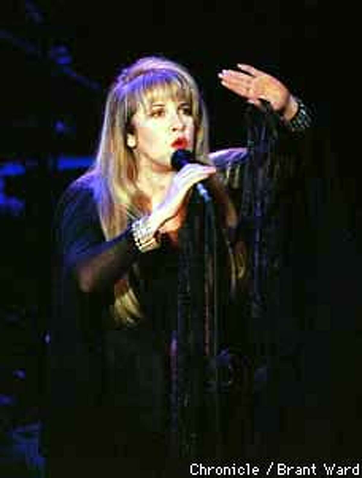 Stevie Nicks opened the concert with a song Tuesday night. By Brant Ward/Chronicle