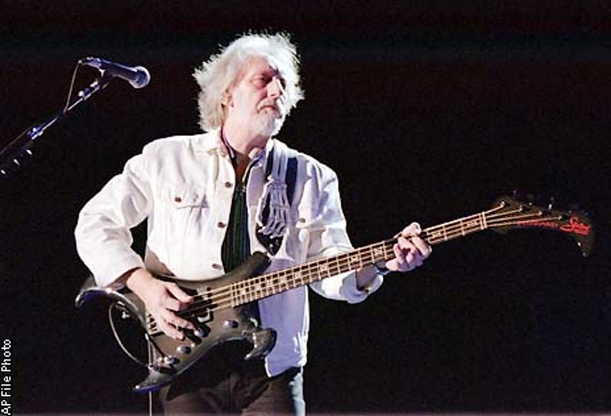 The Who gets a substitute to keep tour going / A 'tribute' to late bassist and millions in