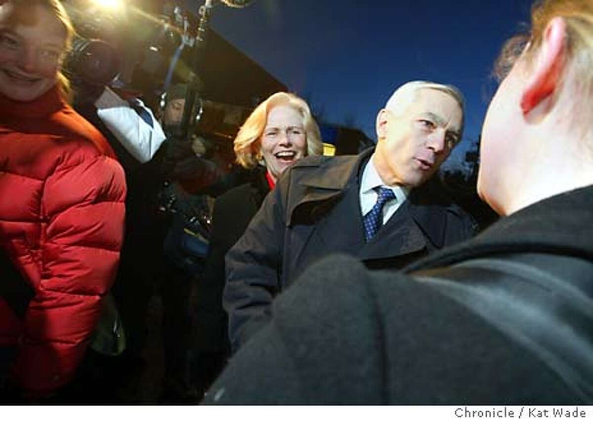 CLARK_0532_KW.jpg Democratic Presidential candidate General Wesley K. Clark and his wife Gert Clark braved the cold to shake hands and talk to University of New Hampshire students as they wait in line to buy school books at the Durham Book Exchange in Portsmouth on 1/21/04. Kat Wade / The Chronicle