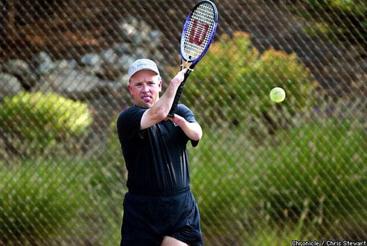 Net worth: Former competitive tennis player Roger Crawford plays tennis with a modified racket in the Granite Bay gated community where he lives with wife Donna and daughter Alexa, 10. Chronicle photo by Chris Stewart