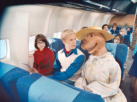 In The Plane Ride Scene Of Scooby-Doo (2002) Fred Can Be Seen Reading ...