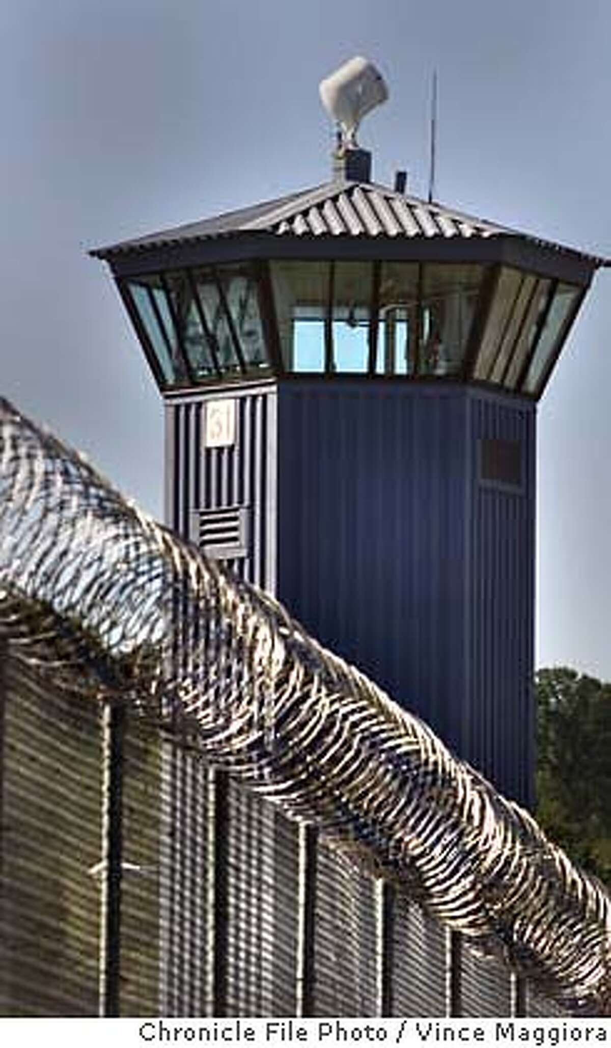 PRISON 4-C-19OCT00-NB-VM One of the guard towers and double fence at the Folsom Prison by Vince Maggiora