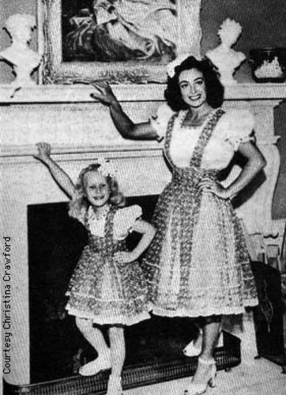 CRAWFORD/B/03DEC97/DD/HO-Joan Crawford (right) and her daughter Christina. COURTESY CHRISTINA CRAWFORD FROM HER BOOK "MOMMIE DEAREST"