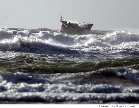 Two people rescued after boat capsizes; one person missing
