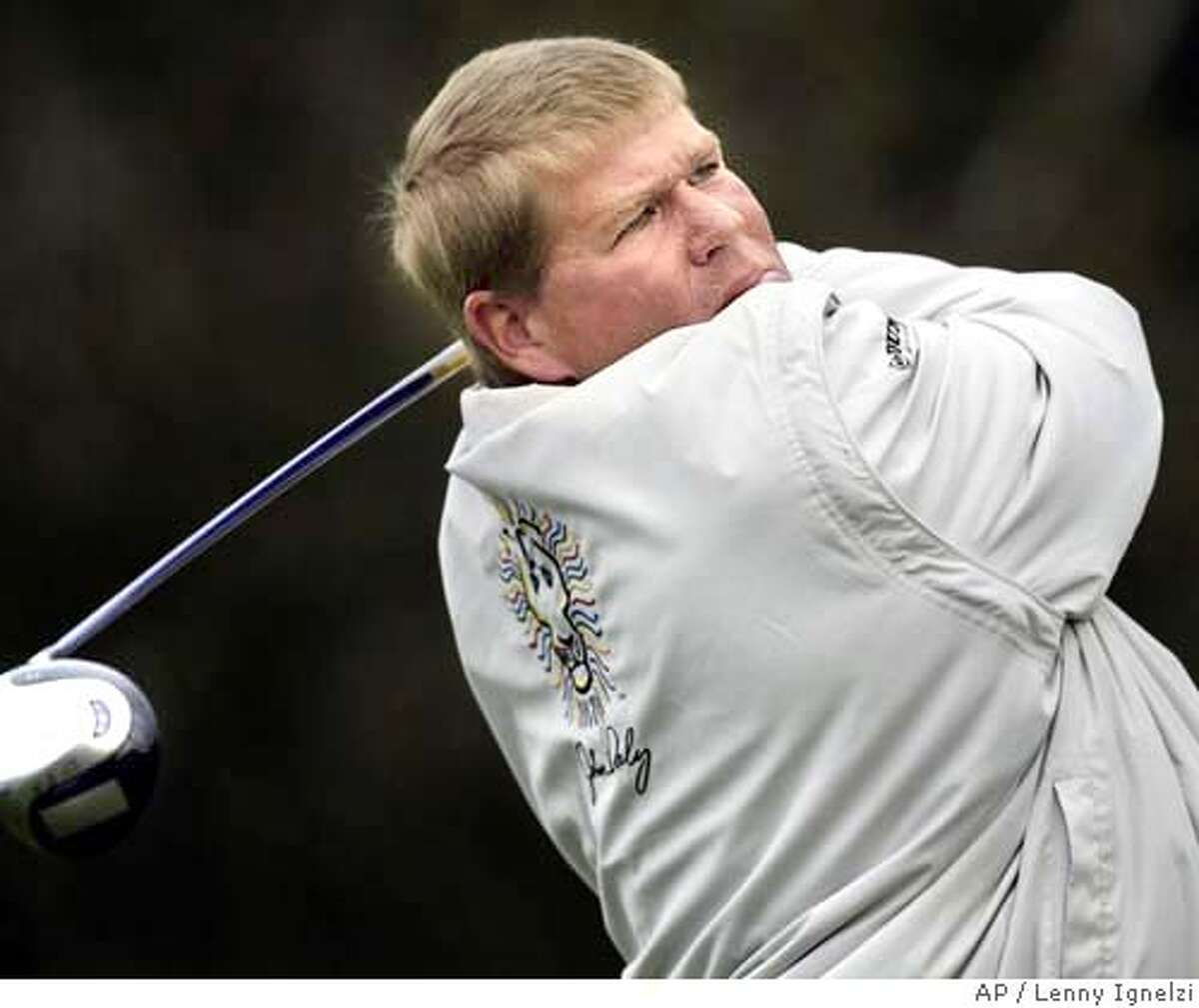 John Daly follow through as he blast a huge drive on the seventh hole during the third round of the Buick Invitational Saturday Feb. 14, 2004 in San Diego. (AP Photo/Lenny Ignelzi)