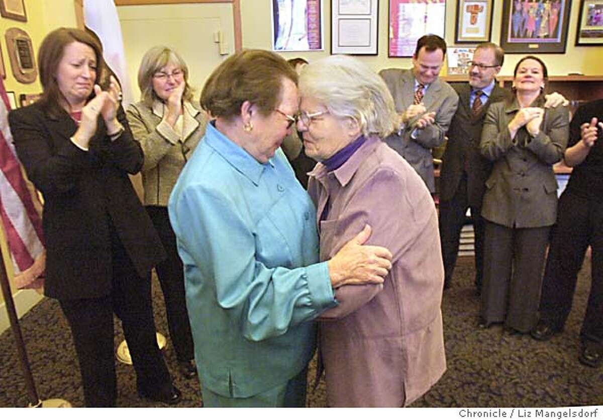 A69C0585.JPG Phyllis Lyon, 79, left, and Del Martin, 83, right, look at each other after being married at city hall. The are the first legally married same-sex couple in San Francisco. In the background is Kate Kendell, Executive director of the National Center for Lesbian Rights, far left. Next to her is Raberta Achtenberg, Senior Vice President of the SF Chamber of Commerce. From Mayor Newsom's office on behind the couple on the right are, from left Joe Caruso, head of Neighborhood services, Steve Kawa, Chief of Staff, and Joyce Newstat, director of Policy for the mayor's office. The first legally married same-sex couple in San Francisco are married by City assessor/Recorder mabel Teng in her office at City Hall. Phyllis Lyon and Del Martin, who have been together for 51 years say their vows. LIZ MANGELSDORF/ The Chronicle