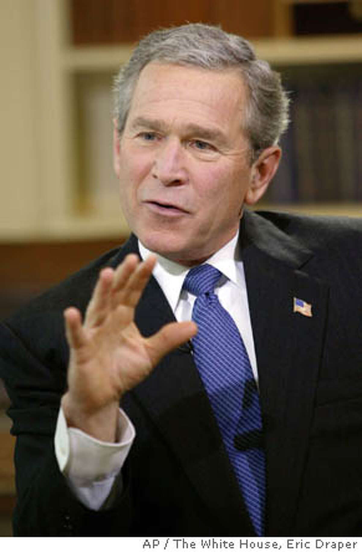 President Bush makes a point as he is interviewed on NBC's "Meet the Press" during a pre-taping Saturday, Feb. 7, 2004, in the Oval Office of the White House in Washington. During the interview with NBC moderator Tim Russert Bush denied he led the nation to war under false pretenses. The show aired on NBC Sunday, Feb. 8, 2004. (AP Photo/The White House, Eric Draper)
