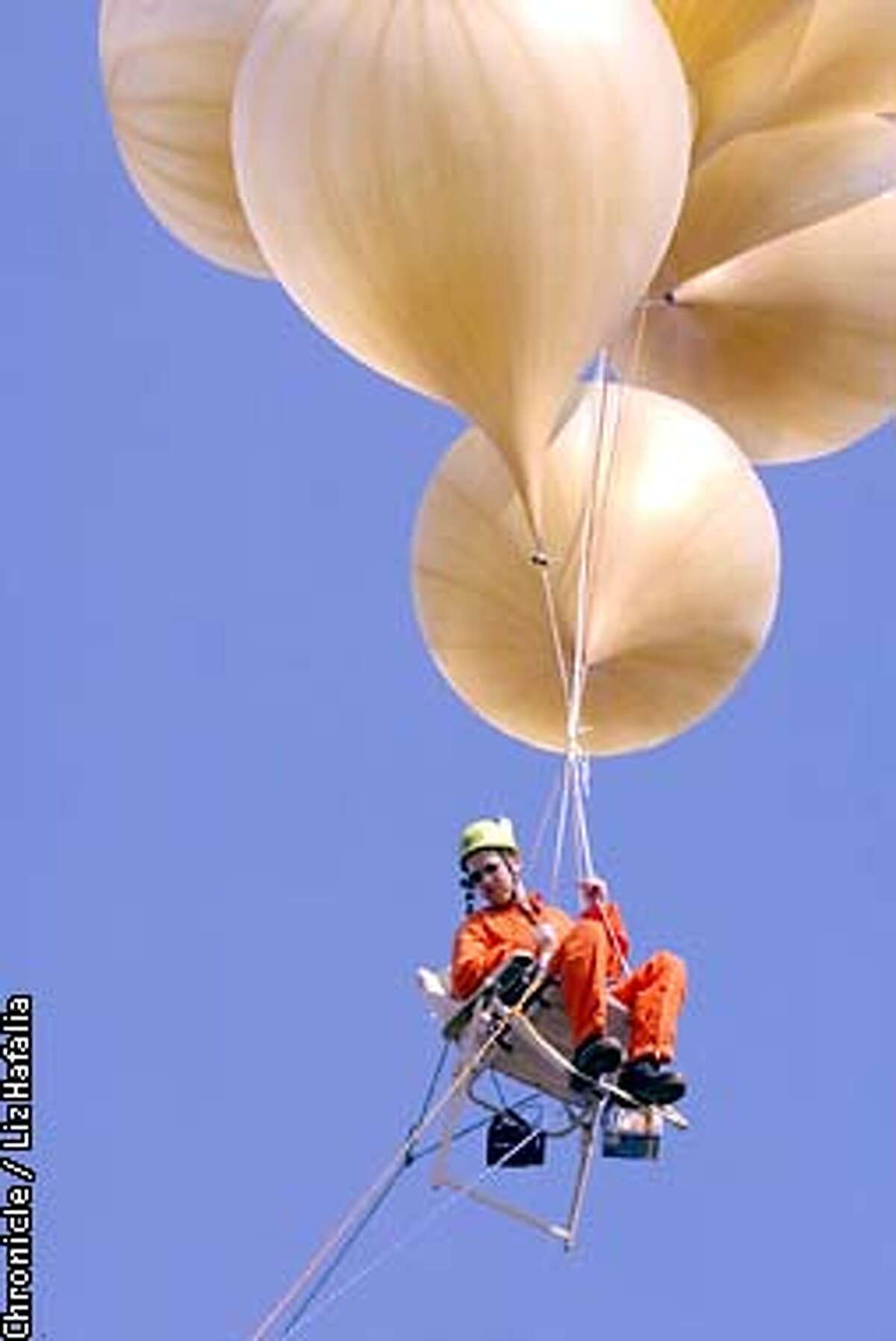As a stunt marking the 20th anniversary of Larry Graham's lawn-chair balloon flight in L.A., a TV documentary crew tethered Adam Savage to a lawn chair with helium balloons. (PHOTOGRAPHED BY LIZ HAFALIA/THE SAN FRANCISCO CHRONICLE)
