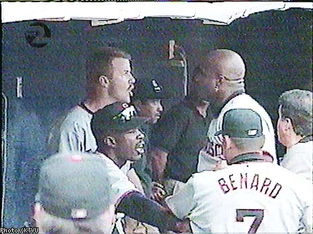 Jeff Kent and Barry Bonds get into it after the Padres scored five runs in the second inning; Bonds hit a three-run homer afterward. Photo courtesy of KTVU