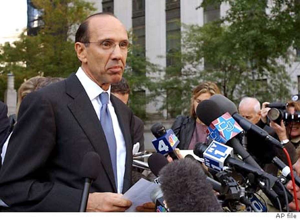 Sam Waksal, founder and former CEO of ImClone Systems, Inc., and a friend of Martha Stewart's, reads a statement outside federal court Tuesday, Oct. 15, 2002, in New York, after pleading guilty to multiple charges in the company's insider trading case. (AP Photo/Louis Lanzano) CAT