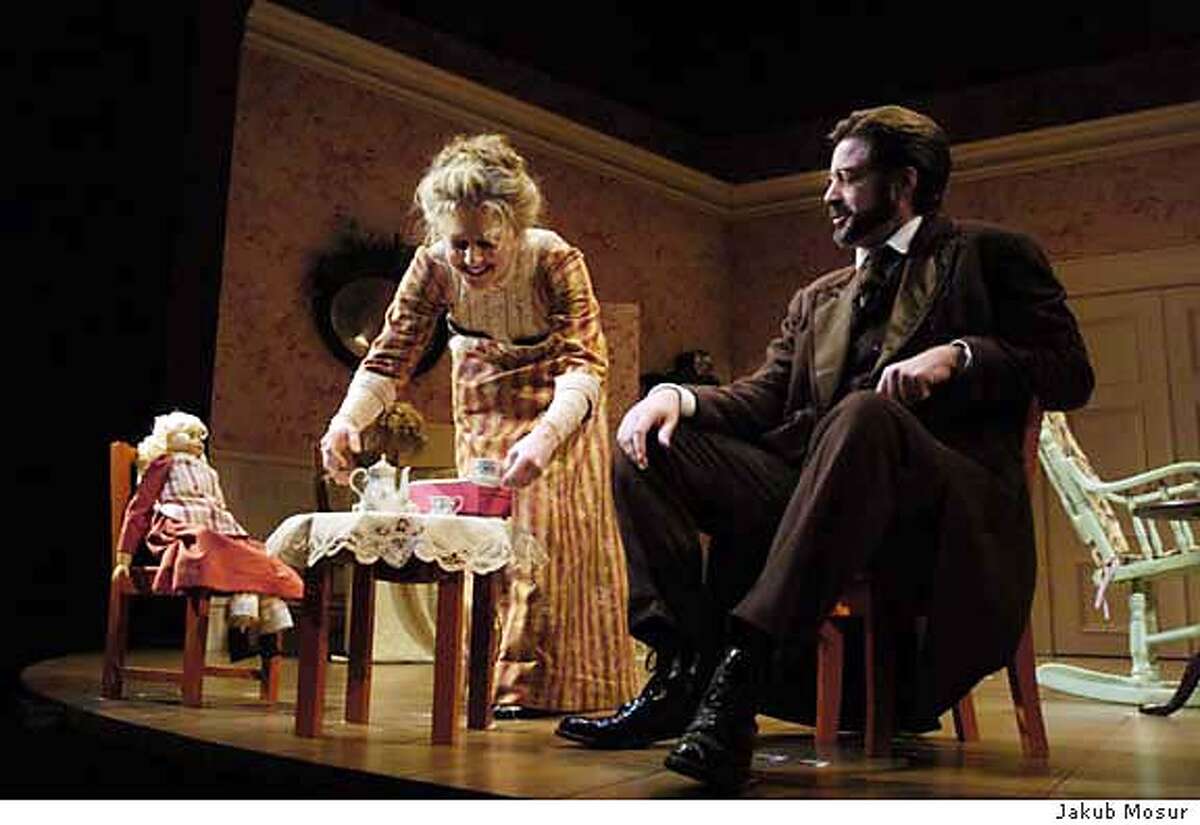 Ren� Augesen, playing Nora Helmer, and Stephen Caffrey, playing Torvald Helmer, perform together during a dress rehersal of Henrik Ibsen's a Doll's House at the A.C.T. Geary Theater in San Francisco on Thursday, Jan. 8, 2004. Event on 1/8/04 in San Francisco. JAKUB MOSUR / The Chronicle