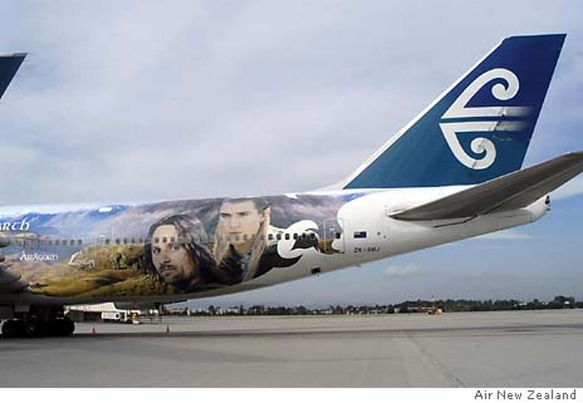FOR BUZZ30; Los Angeles - Leading up to the December 17 U.S. release of New Line Cinema's The Lord of the Rings: The Return of the King, Air New Zealand, "Airline to Middle-earth," unveiled the third in their fleet of The Lord of the Rings-themed planes this week at LAX. Featuring designs inspired by the third and final film in producer/director/co-writer Peter Jackson's trilogy, the Boeing 747-400 aircraft depicts Lake Wanaka looking towards the Matukituki Valley in New Zealand's South Island- a sweeping backdrop of tussock, lake and mountains, inset with the faces of cast members Viggo Mortensen (Aragorn) and Orlando Bloom (Legolas.)