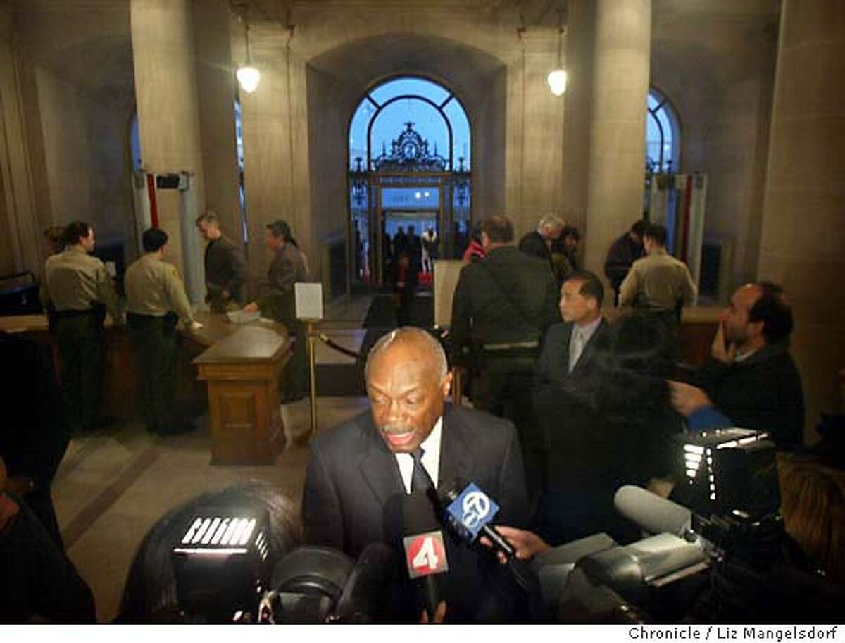 San Francisco Mayor Willie Brown talks with the media before th surprise party for Charlotte Shultz at city hall. Liz Mangelsdorf/ The Chronicle MANDATORY CREDIT FOR PHOTOG AND SF CHRONICLE/ -MAGS OUT